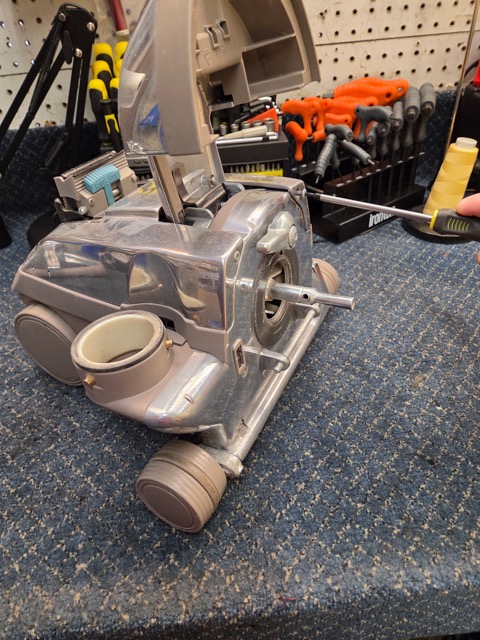Vacuum cleaner undergoing service